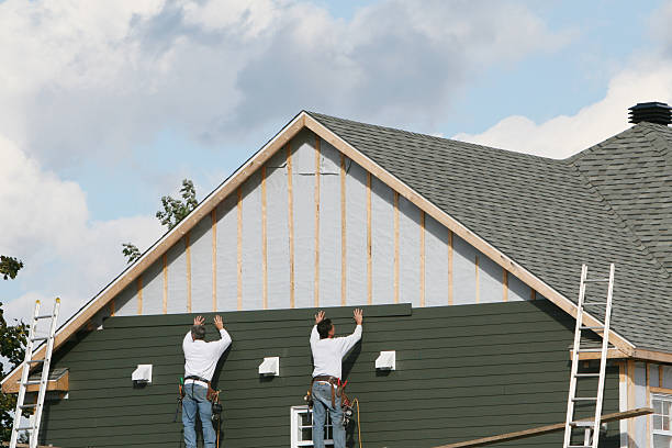 Professional Emergency Siding Repair technician working in Bergholz, OH